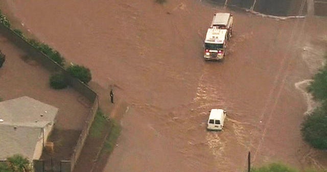 Severe flooding swamps cars in Arizona CBS News