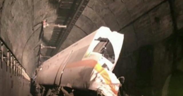 Holiday travelers among dozens killed in Taiwan train crash