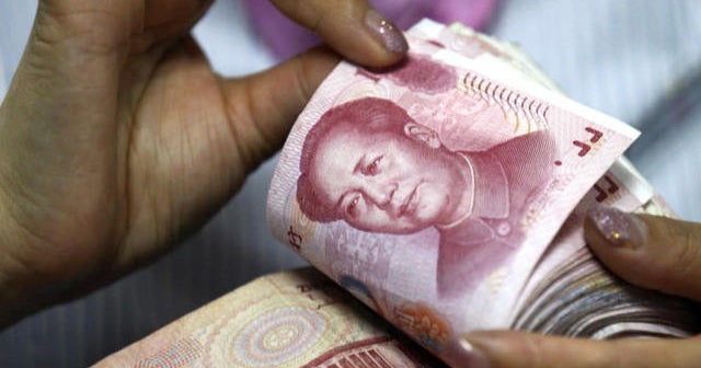 Stocks in turmoil as China devalues currency