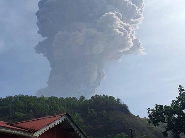 An ash column rises from La Soufriere volcano as seen from Bagga, St. Vincent and the Grenadines, April 9, 2021.