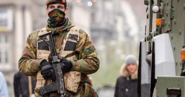 Belgian police arrest 16, Brussels on lockdown