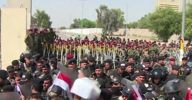 Protesters clash with police in Baghdad