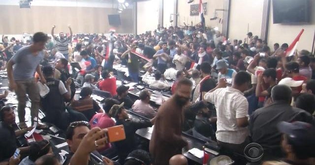 Iraqi protesters storm parliament building in Baghdad