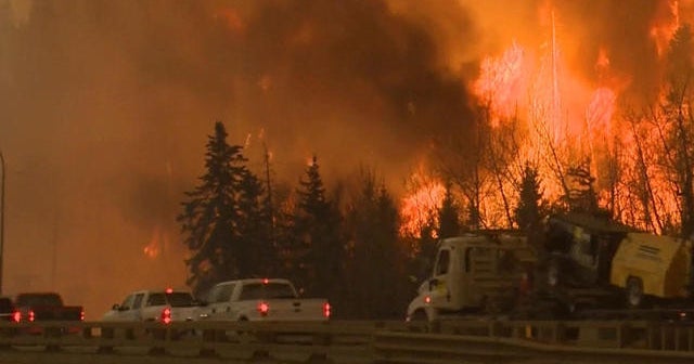 Residents scramble to flee huge Canadian fire
