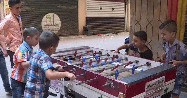 Syrians cautiously emerge as cease-fire holds for 2nd day