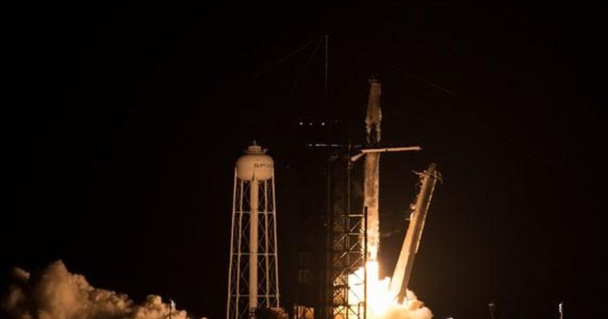 SpaceX launches four astronauts on Crew Dragon flight to space station