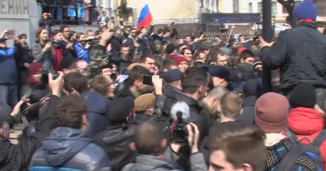 Hundreds arrested at anti-Putin protests across Russia