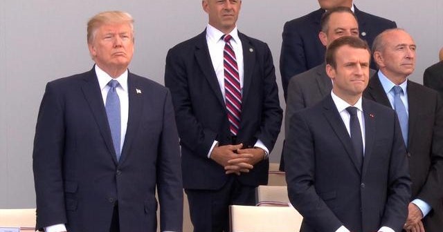Trump attends Paris Bastille Day parade amid Russia uproar