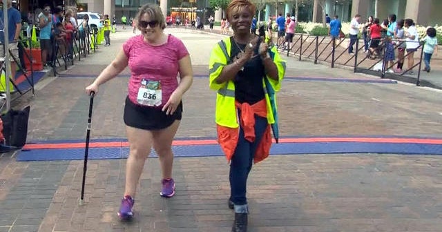 DC runner overcomes cerebral palsy to race