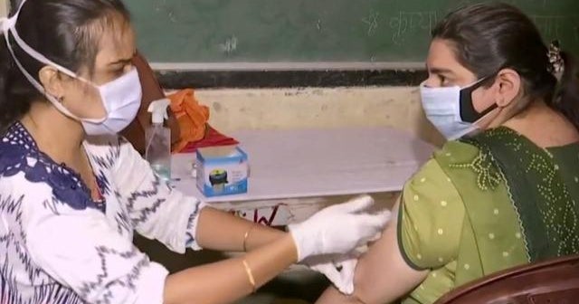 India under pressure to lock down as COVID cases surge
