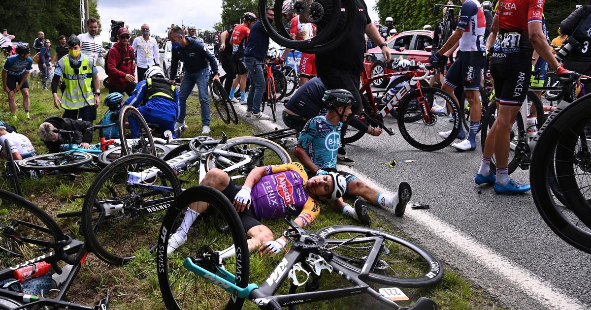A spectator at the Tour de France who caused a massive crash involving dozens of cyclists is missing as race authorities plan to sue her. Tour de Fran