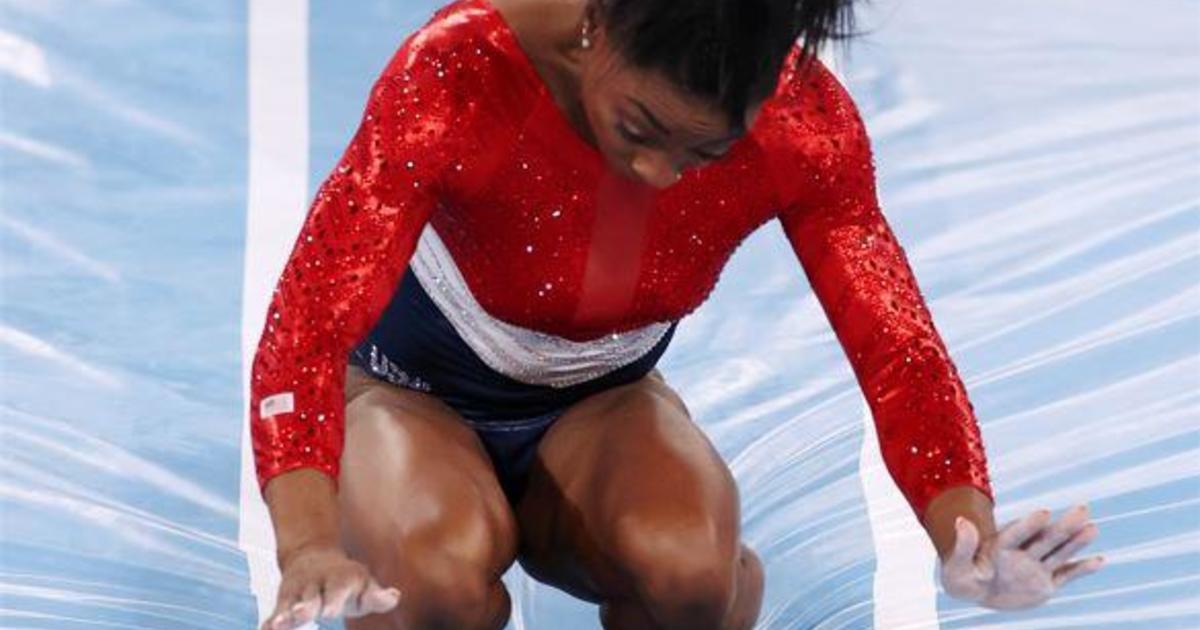 Olympic champion Simone Biles is out of team finals with apparent injury