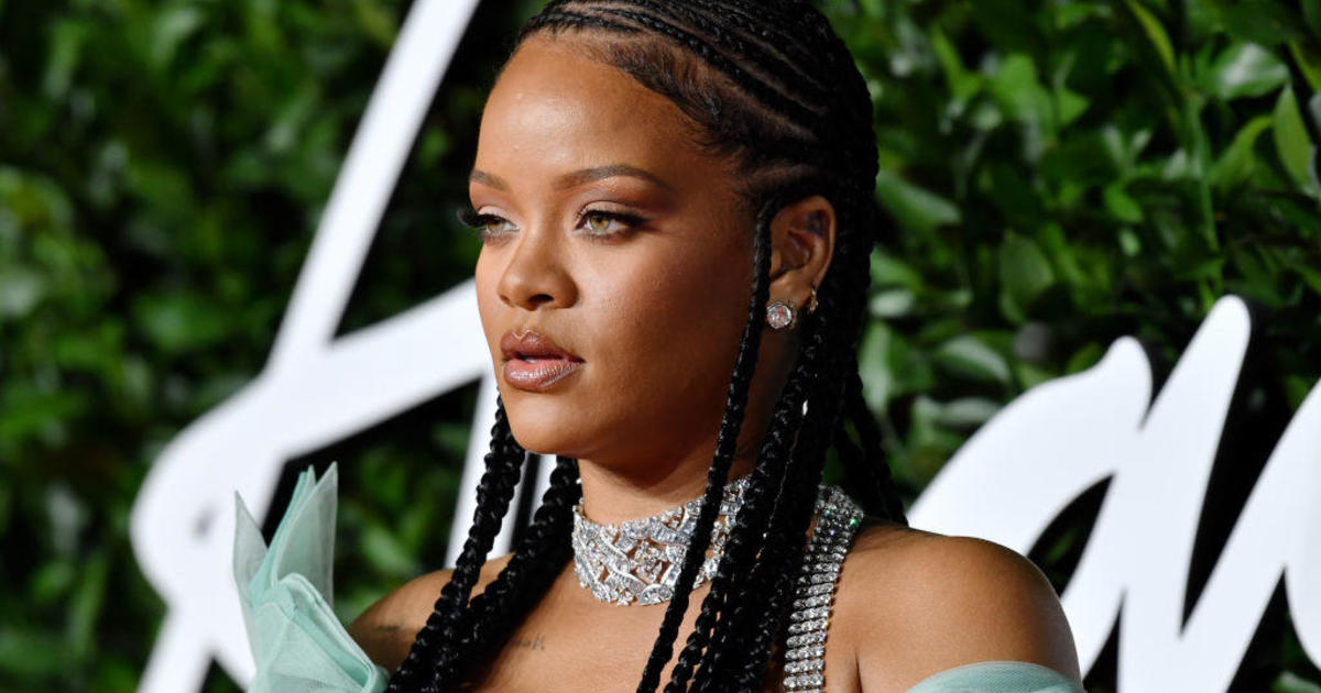 Rihanna is officially a billionaire at 33 years old, according to Forbes