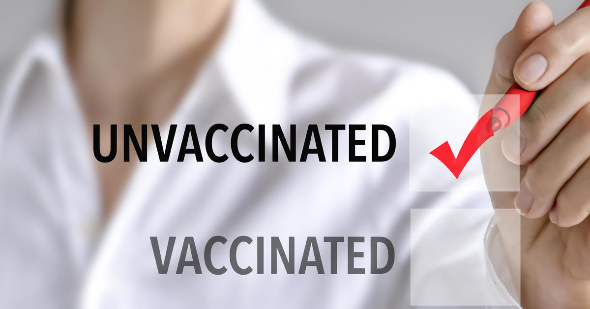 Unvaccinated workers could end up paying $50 more for health insurance — per paycheck