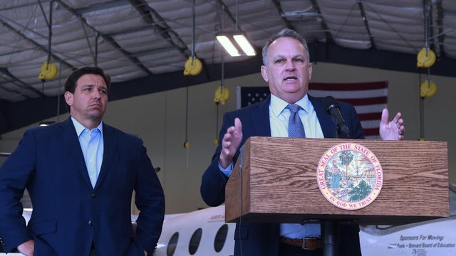Florida Governor, Ron DeSantis looks on as Florida Education
