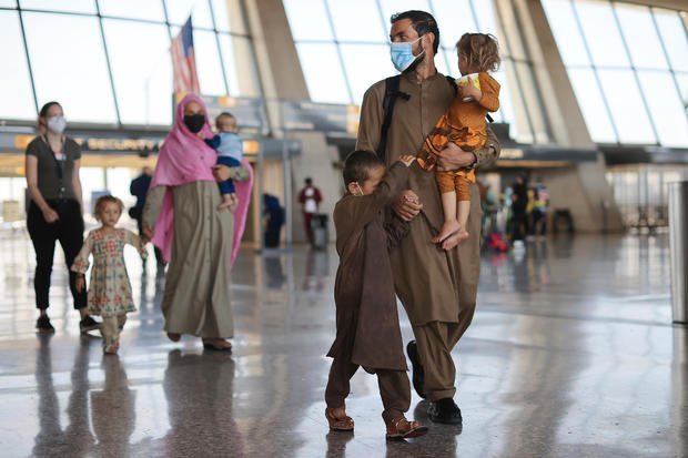 Afghan Refugees Arrive At Dulles Airport Outside Nation's Capital 