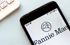 In this photo illustration a Fannie Mae logo seen displayed 