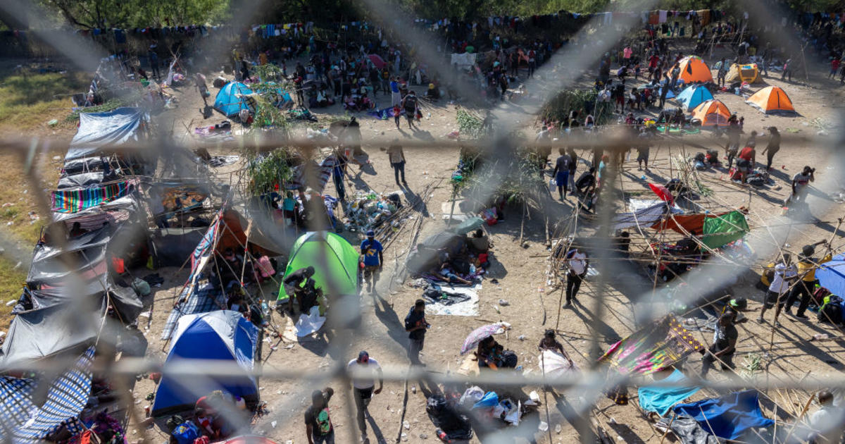 Thousands of Haitian migrants waiting under Texas bridge in squalid conditions