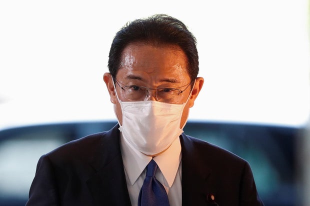 Japan's newly-elected PM Kishida arrives at his official residence in Tokyo