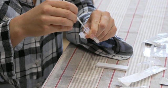 Home tests part of daily life for U.K. students and workers
