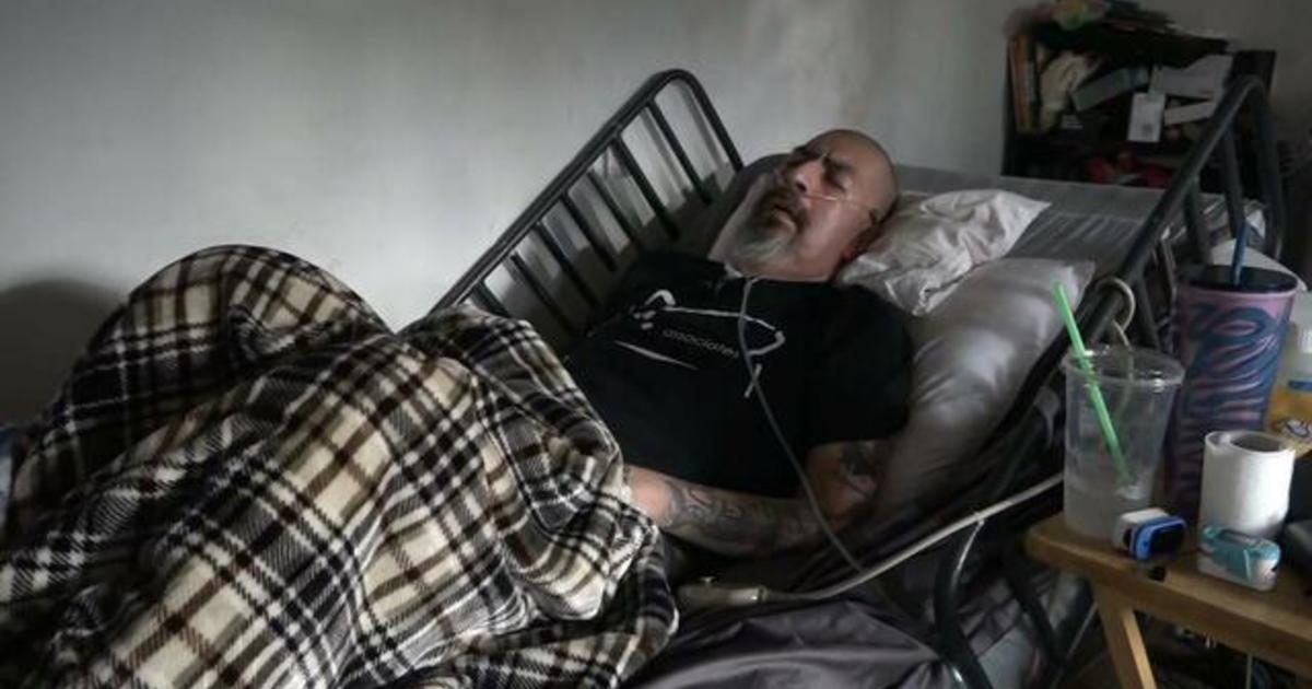 Inside the life of a COVID long-hauler who "fought like an animal" to make it out of the hospital after 299 days