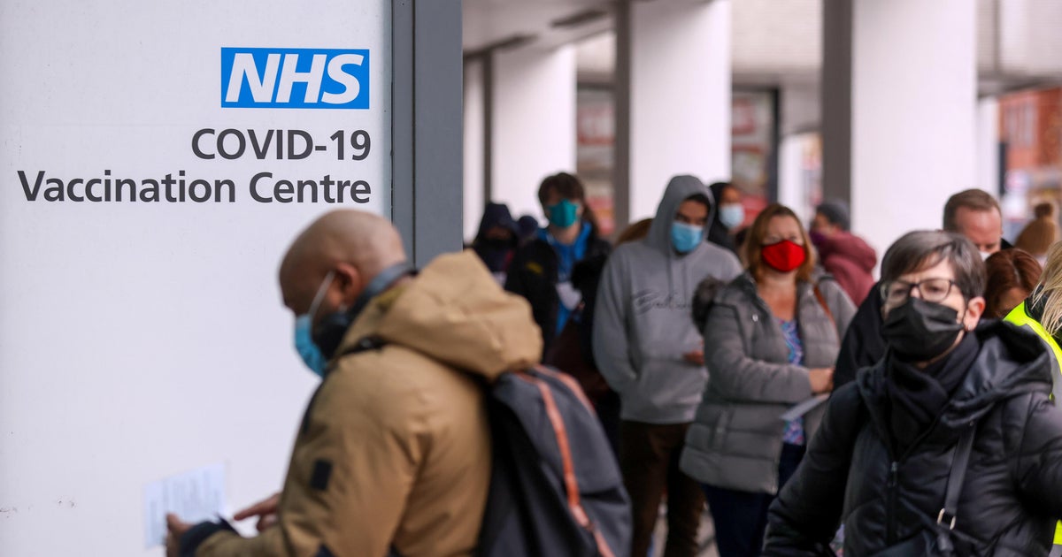 First Omicron death confirmed in U.K. as PM warns of "tidal wave" of infections