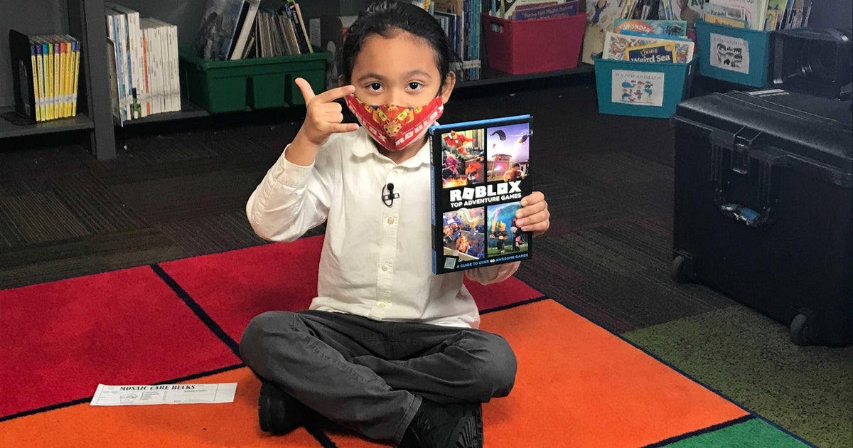 New York City school rewards good behavior with tokens for a book vending machine