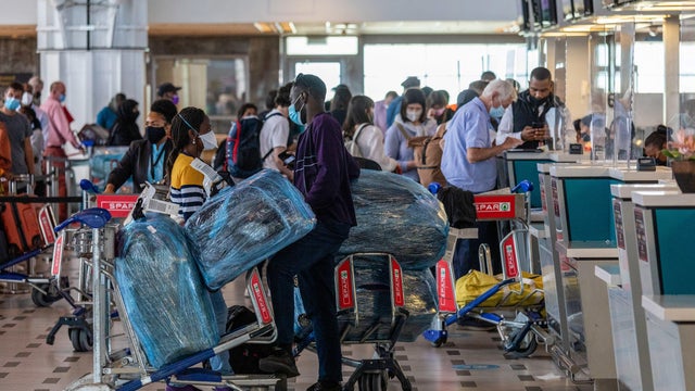 Travelers at Cape Town International Airport as Omicron Variant Spreads 