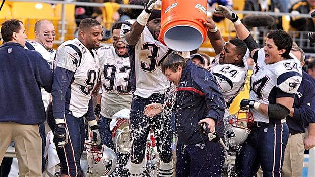 Patriots players dump water on head coach Bill Belichick 