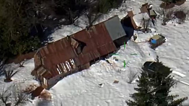An image from aerial footage from a California Highway Patrol helicopter shows the area where two people and a dog were rescued in Northern California on February 1, 2022. 