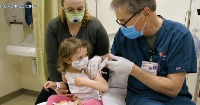 Some states roll back restrictions as COVID cases fall