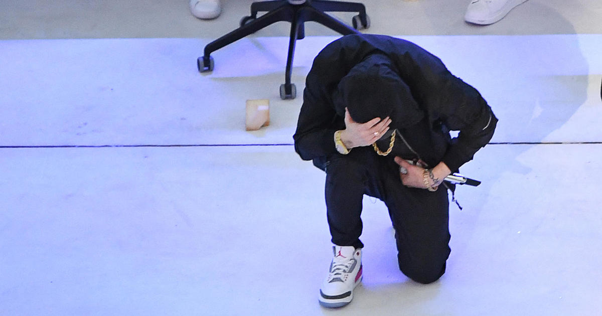 Eminem takes a knee during Super Bowl halftime show