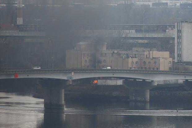 Smoke rises from the territory of the Ukrainian Defence Ministry's unit in Kyiv 