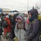 Ukrainian women join the fight from the border as families cross borders