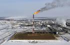 FILE PHOTO: A flame burns from a tower at Vankorskoye oil field owned by Rosneft company north of the Russian Siberian city of Krasnoyarsk