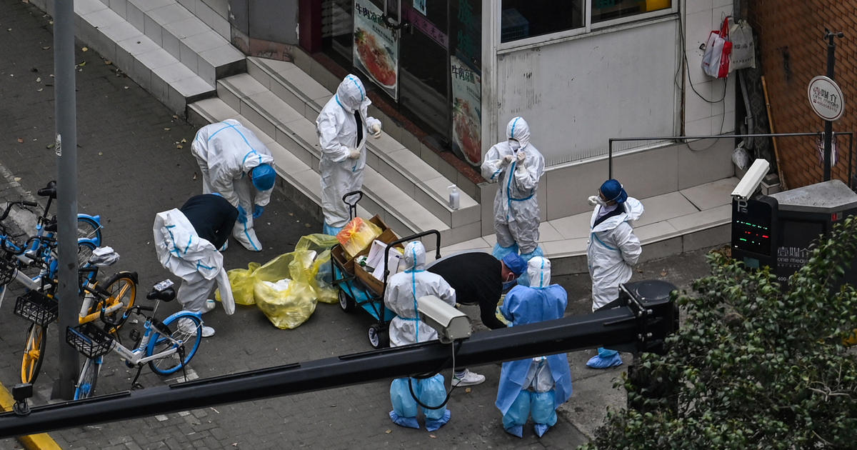 China extends lockdown of Shanghai as coronavirus cases mount despite  draconian "zero-COVID" policy - CBS News