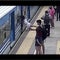 Dramatic video shows woman fainting, falling through gap of moving train in Argentina &mdash; and being pulled up alive