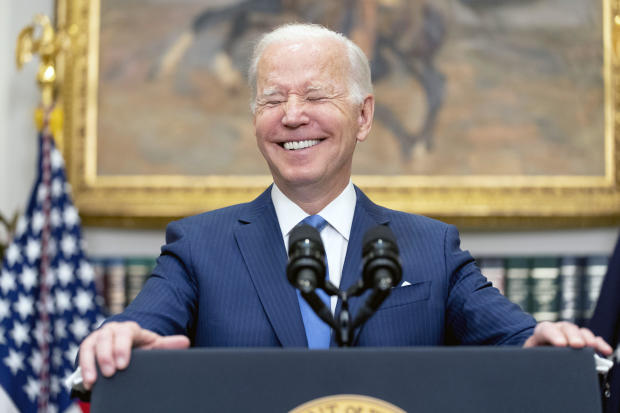President Biden smiles while speaking in the Roosevelt Room at the White House, April 28, 2022, in Washington. 