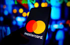 In this photo illustration the Mastercard logo seen 