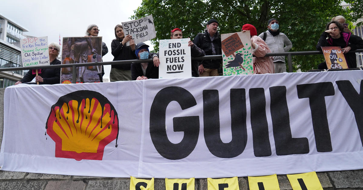Singing “We will, we will stop you,” climate change activists disrupt Shell shareholders meeting; some glued themselves to seats – World news