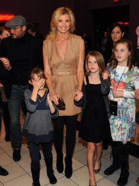 Tim McGraw, Faith Hill and daughters, 2009, at ‘Blind Side’ Premiere (Photo by Rick Diamond/Getty Images)