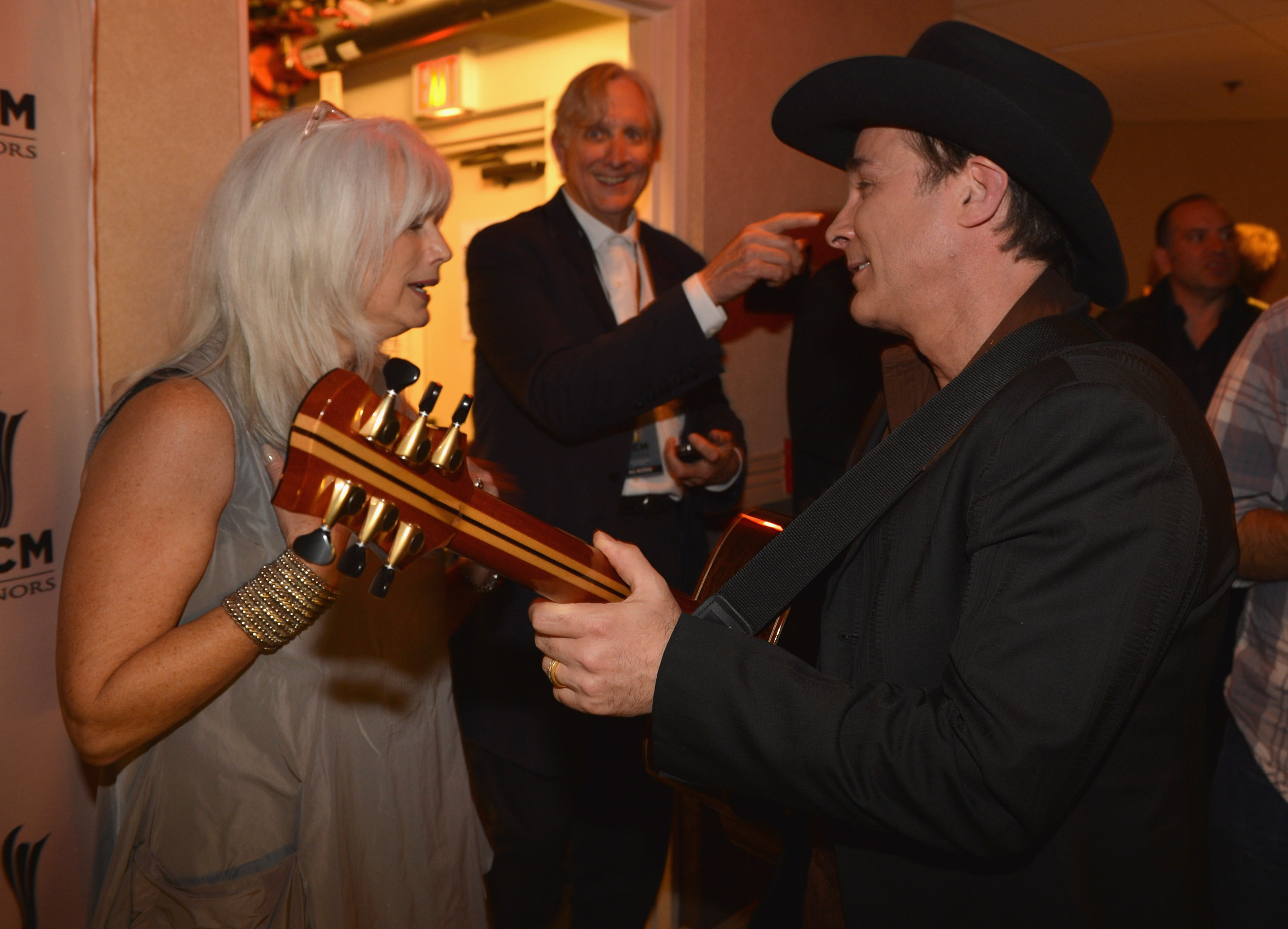 (L-R) Emmylou Harris, T Bone Burnett, and Clint Black at the 6th Annual ACM Honors (Photo by Rick Diamond/Getty Images for ACM)